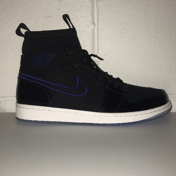 black jordans with blue bottom